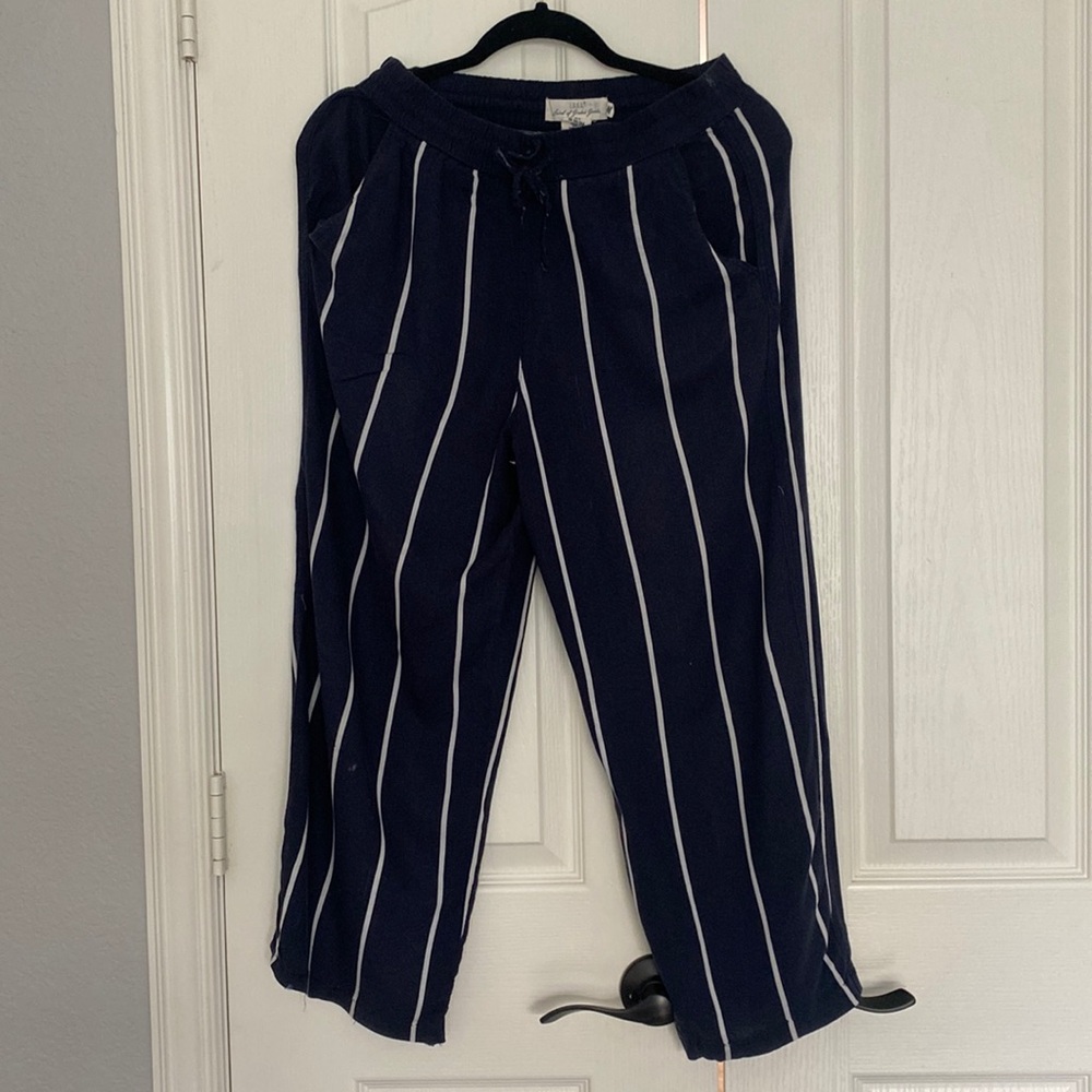 This is an H&M loose dark blue pants size 4.